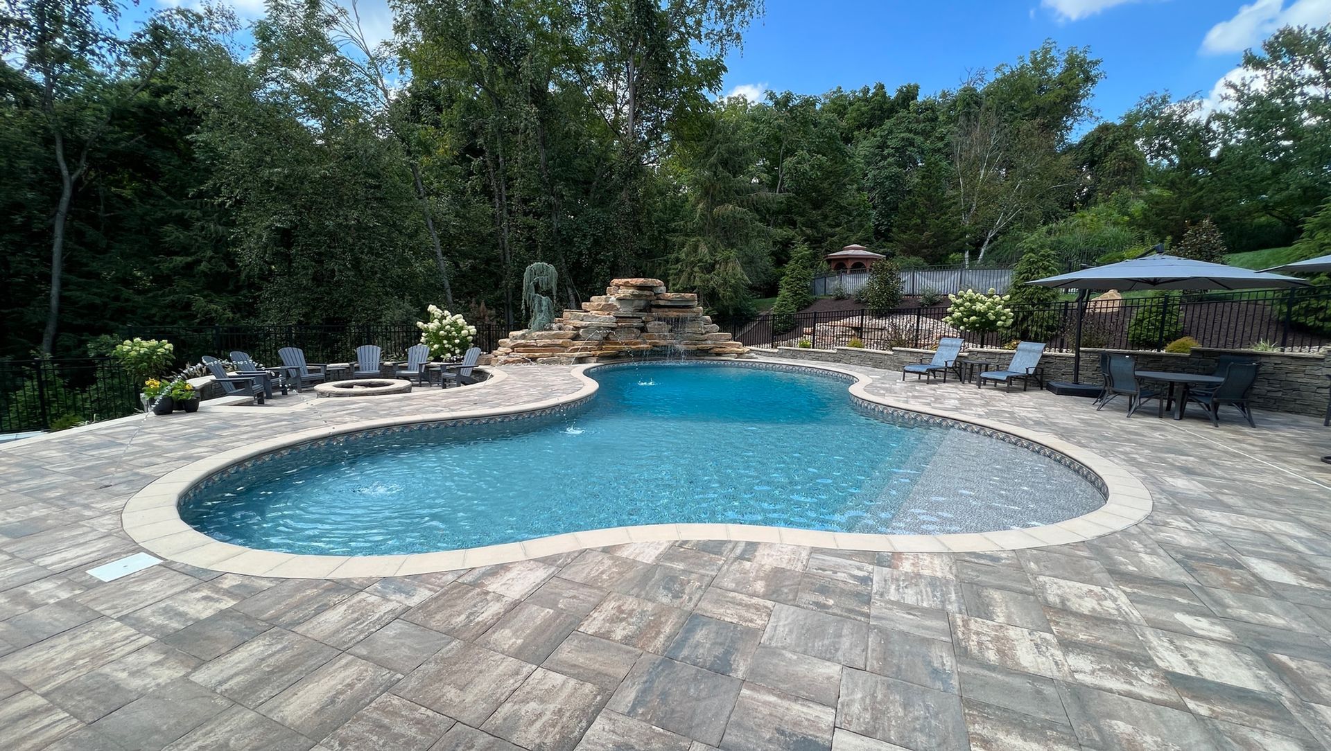 The Amazing Benefits of Adding a Waterfall to Your Pool 