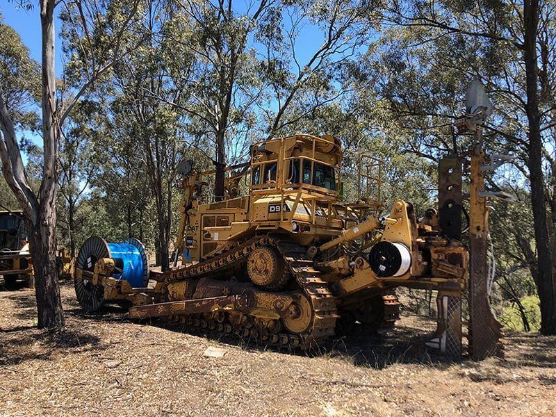 Bulldozer In Forest — Equipment Repairs in Singleton, NSW