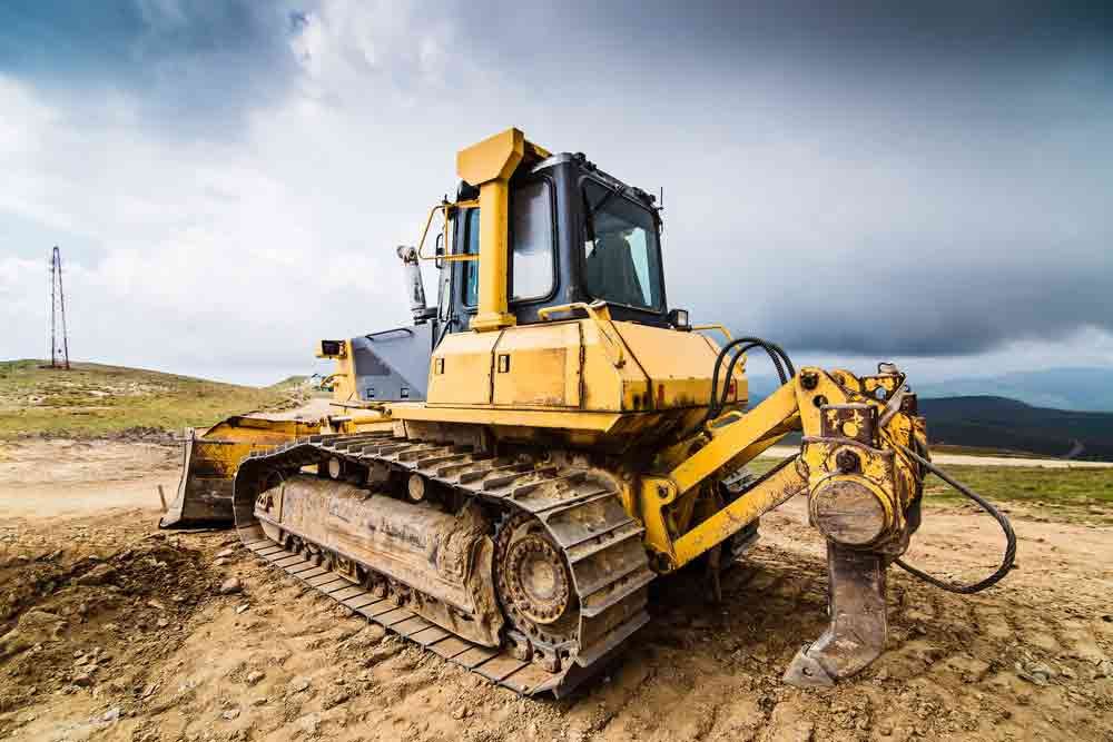 Yellow Bulldozer Doing Road Construction