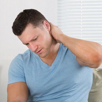 Man Touching his Neck — Pain Management in Quakertown, PA