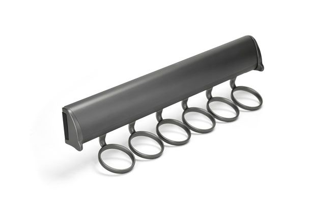 a black object with a bunch of rings on it on a white background .