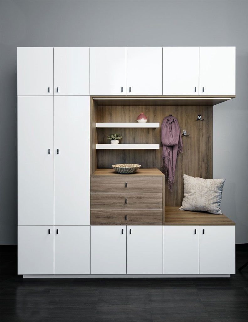 a mudroom cabinet system with white finish and drift insert