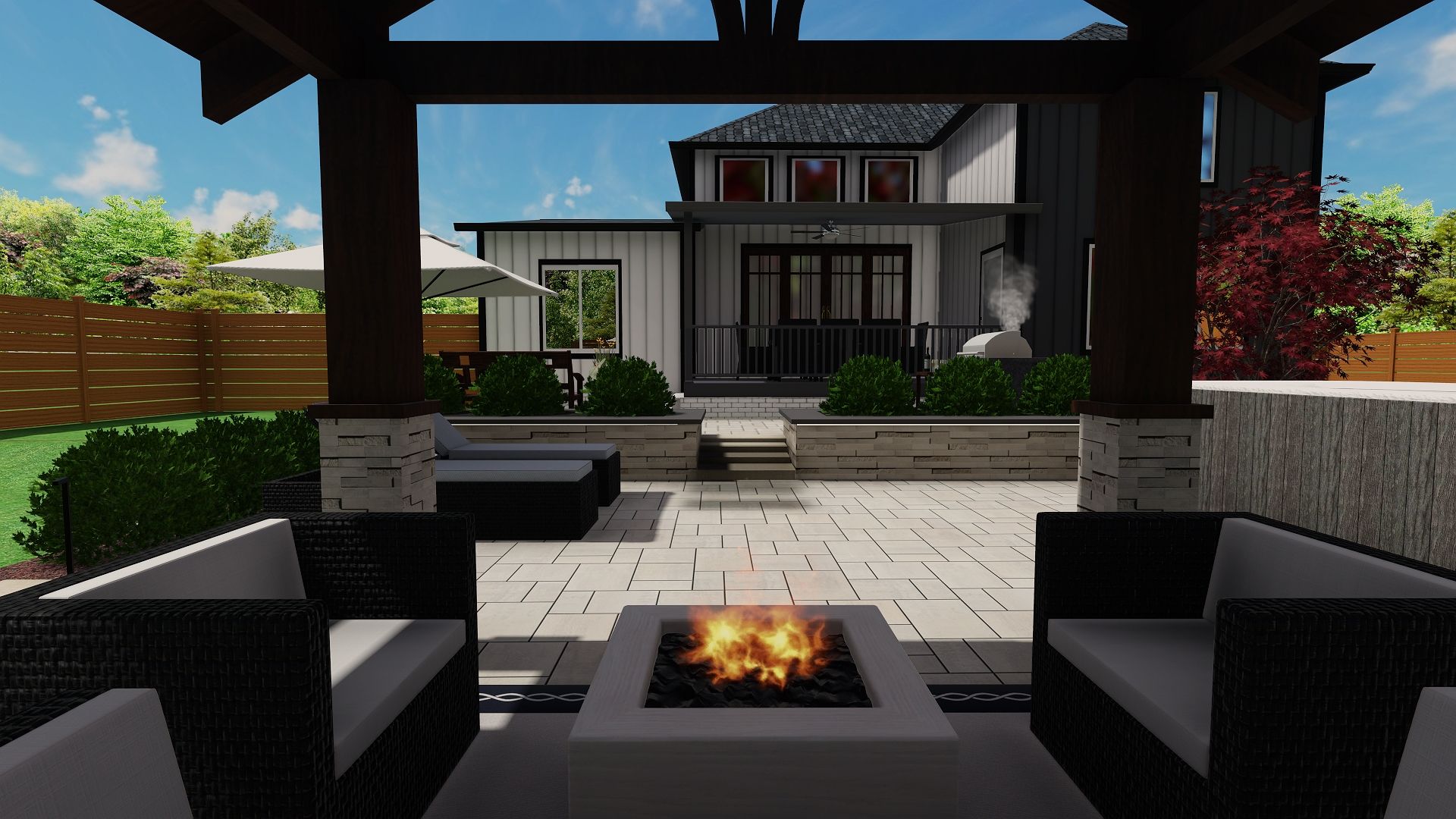 There is a fire pit in the middle of the patio.