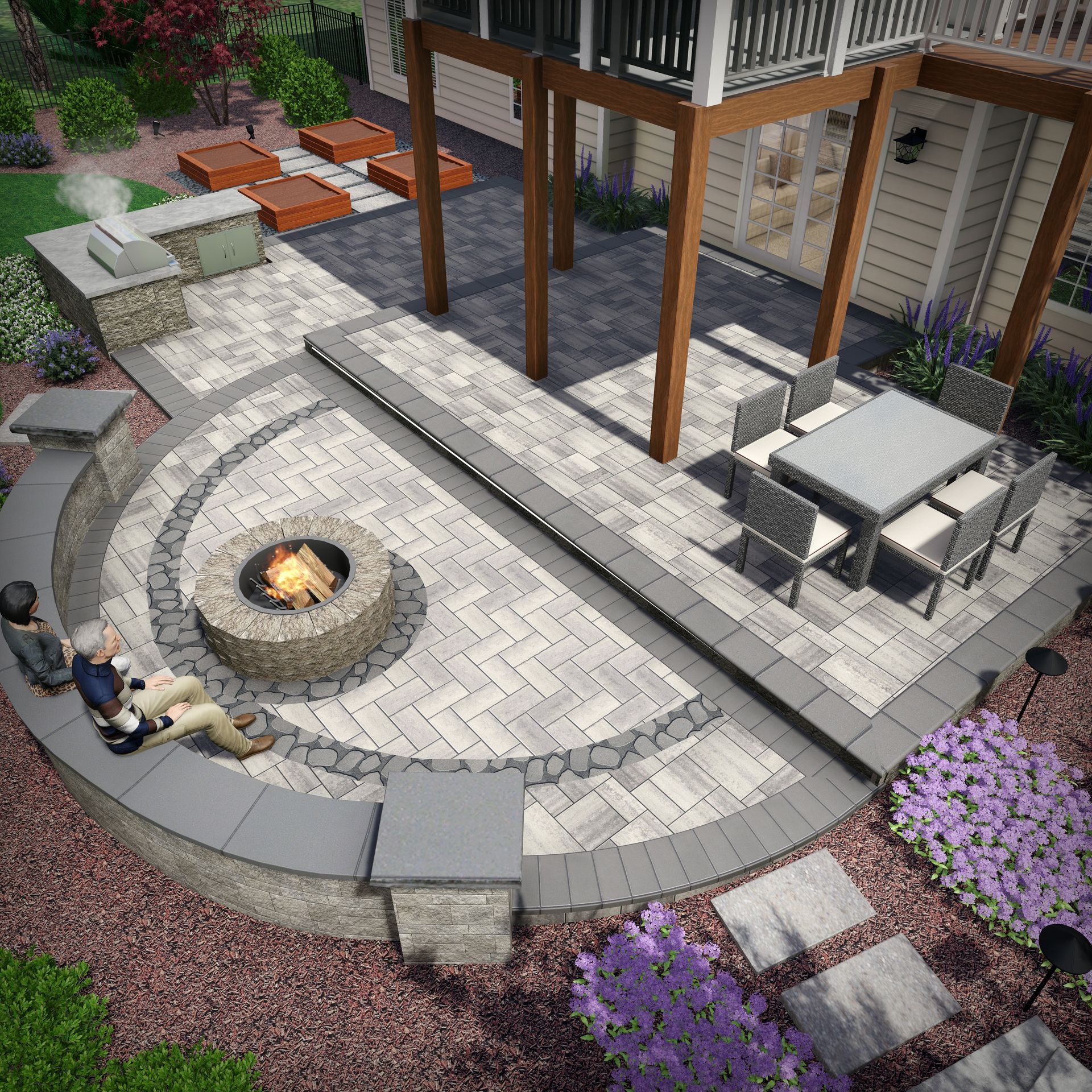 An aerial view of a patio with a fire pit and a table and chairs