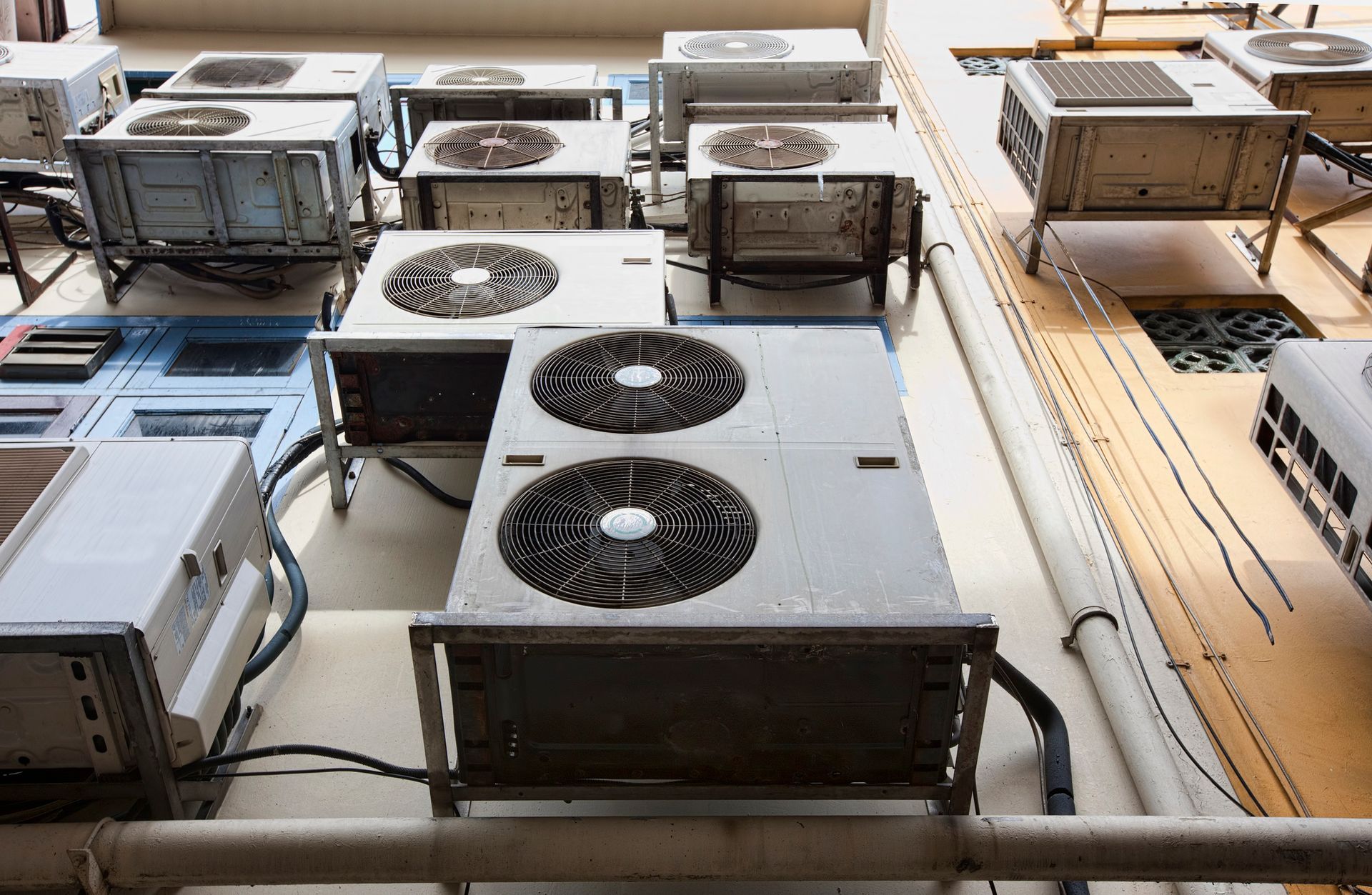 Installing an air conditioner unit indoors. Installing an air conditioner unit indoors.