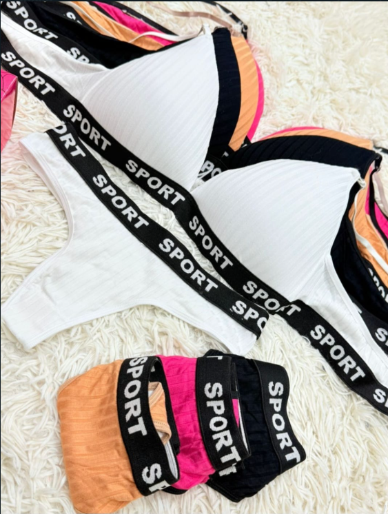 Conjunto de sujetador y tanga deportivo de color blanco, con otros conjuntos de color, todos con banda 