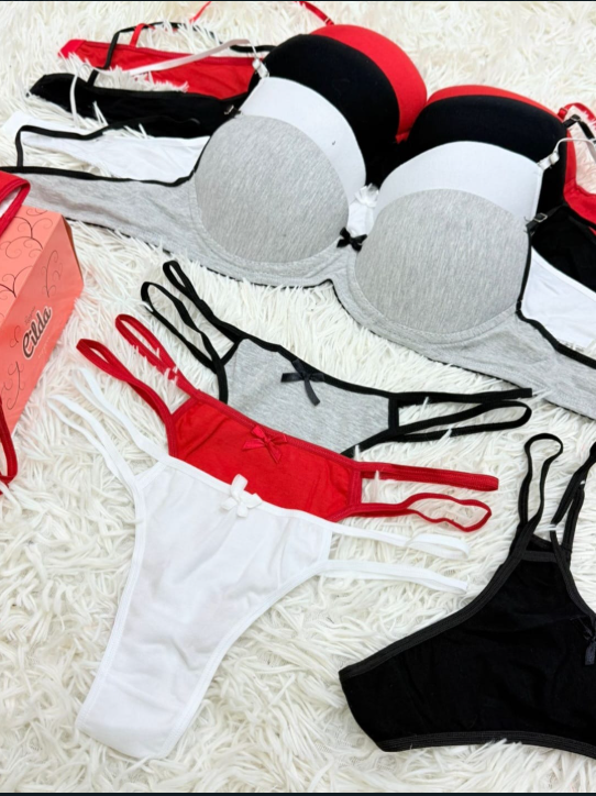 Sujetadores y ropa interior tipo tanga en varios colores: rojo, negro, blanco y gris.