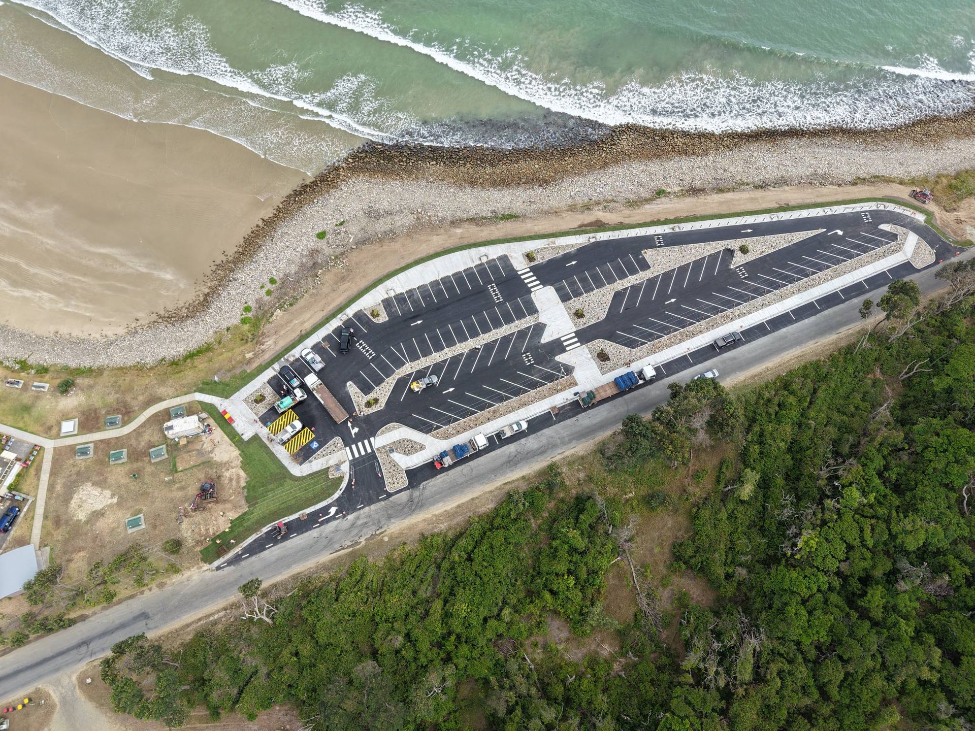 Aerial view of a coastal parking lot next to the beach — Jim Anderson Earthmoving Pty Ltd In Coopernook, NSW