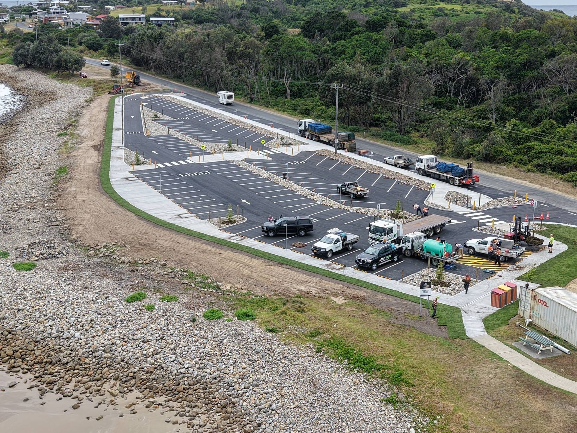 Aerial view of a parking lot construction site near a coastline — Jim Anderson Earthmoving Pty Ltd In Coopernook, NSW