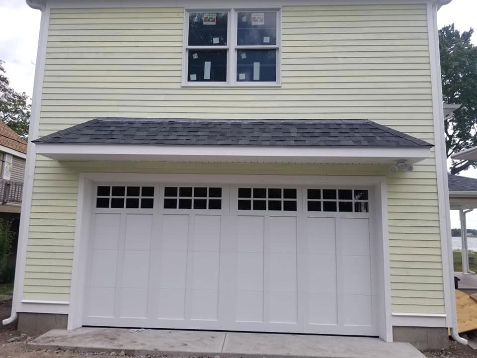 Yellowish Garage Door — Westport, MA — D & D Overhead Garage Doors