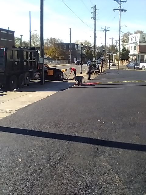 Construction Workers Laying New Asphalt — Bear, DE — S. Hicks Paving LLC