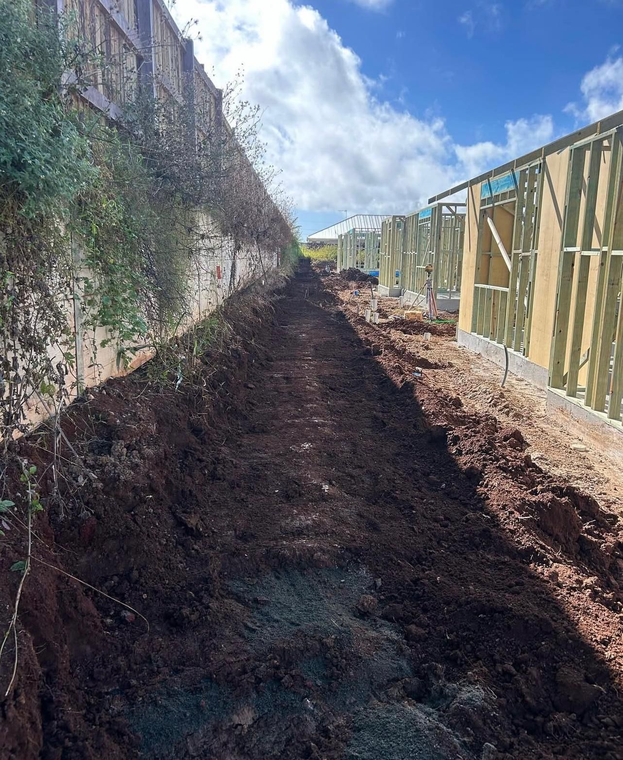 Earthen Pathway Between a Concrete Wall — Chief Structural Landscaping In Glenvale, QLD