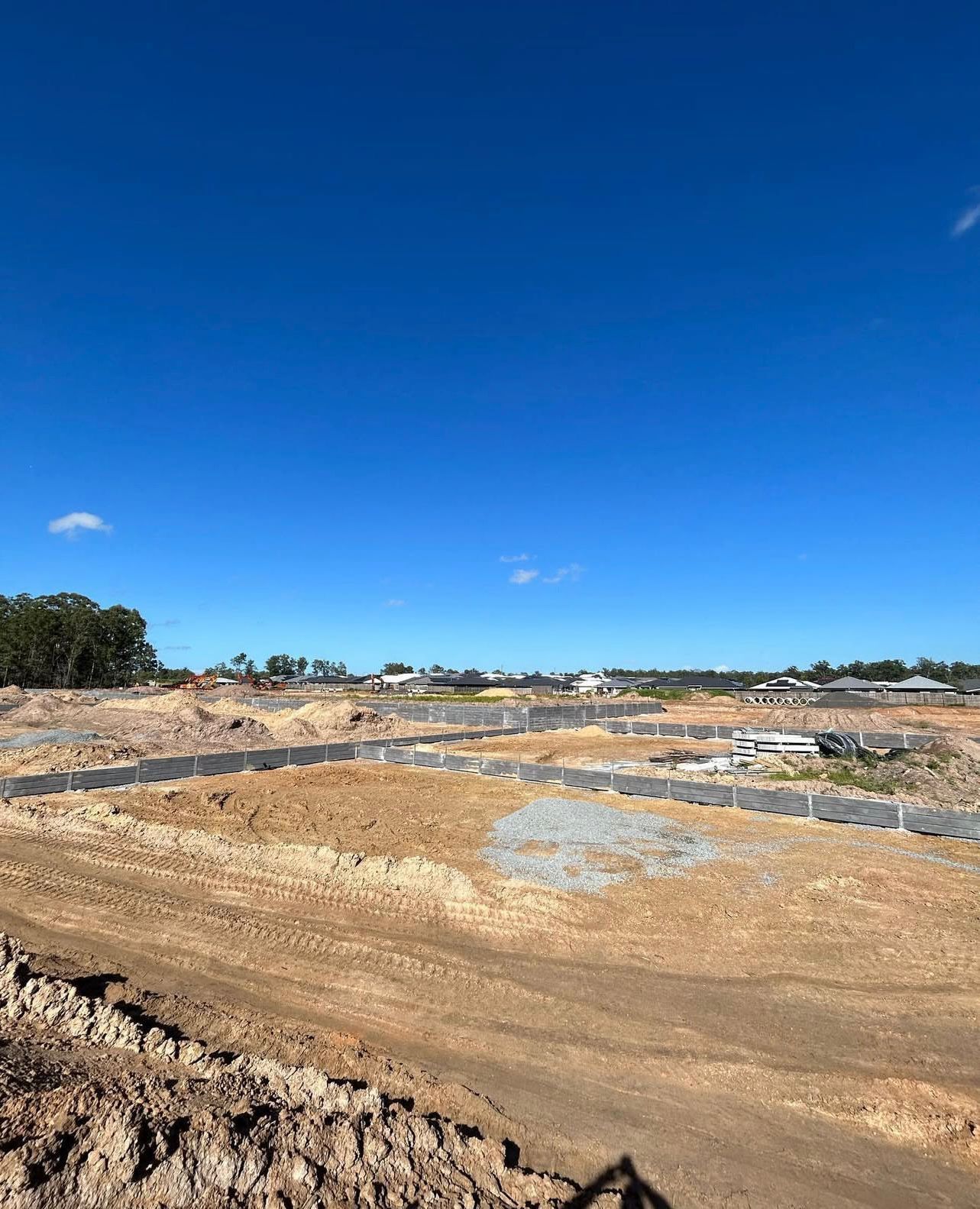 Construction Site With Cleared Land, Dirt, and Retaining Walls — Chief Structural Landscaping In Glenvale, QLD