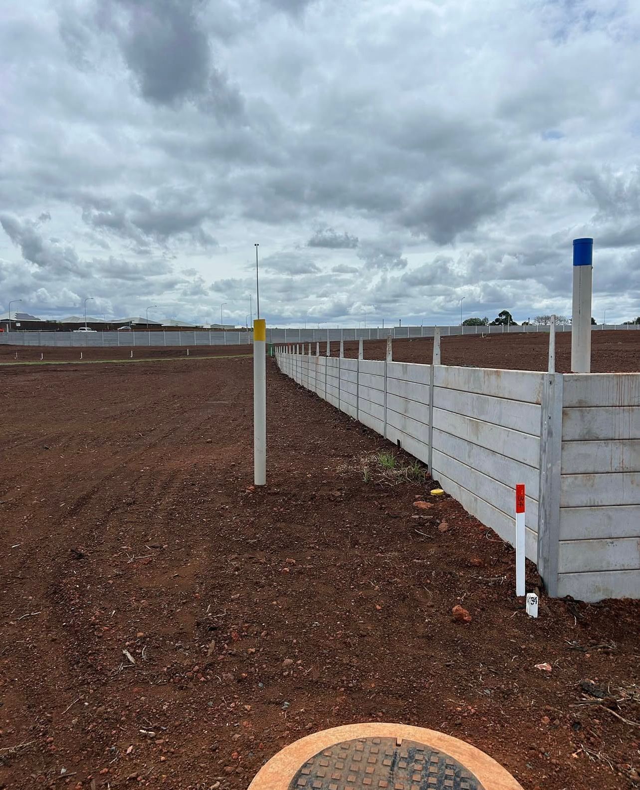 A Construction Site With a Concrete Fence — Chief Structural Landscaping In Glenvale, QLD