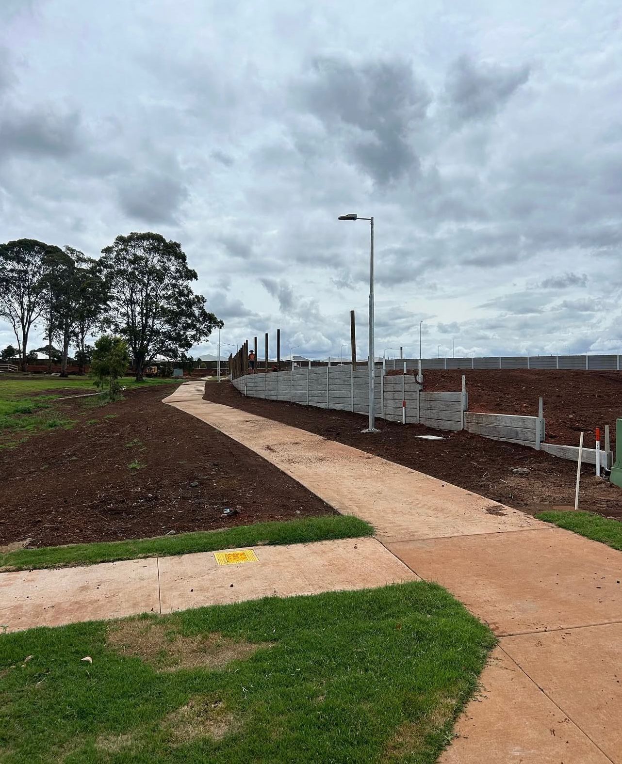 A Dirt Path Curves Through a Construction Site — Chief Structural Landscaping In Glenvale, QLD