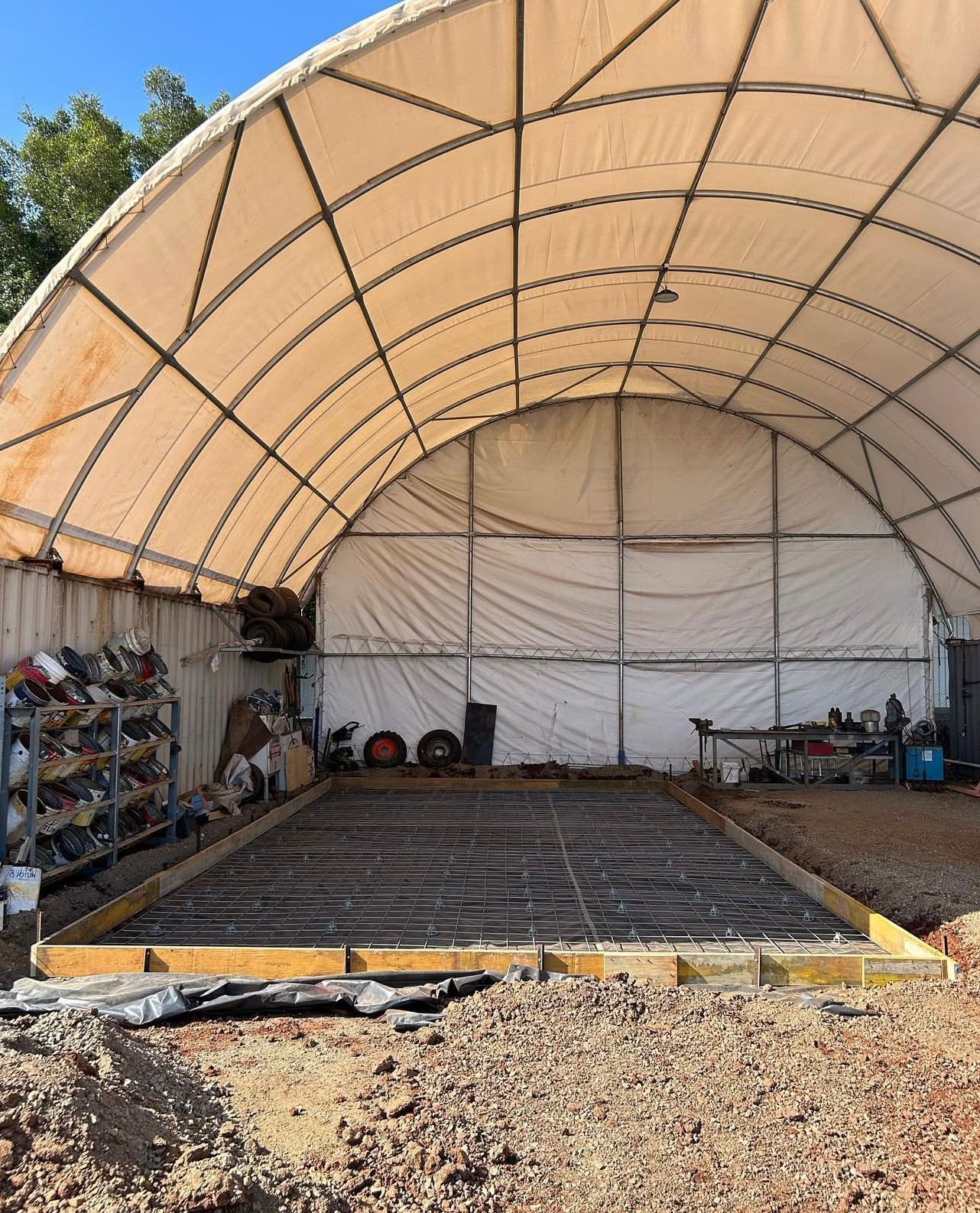 Concrete Foundation With Rebar Forms a Rectangle, Set in a Dirt Yard — Chief Structural Landscaping In Darling Downs, QLD
