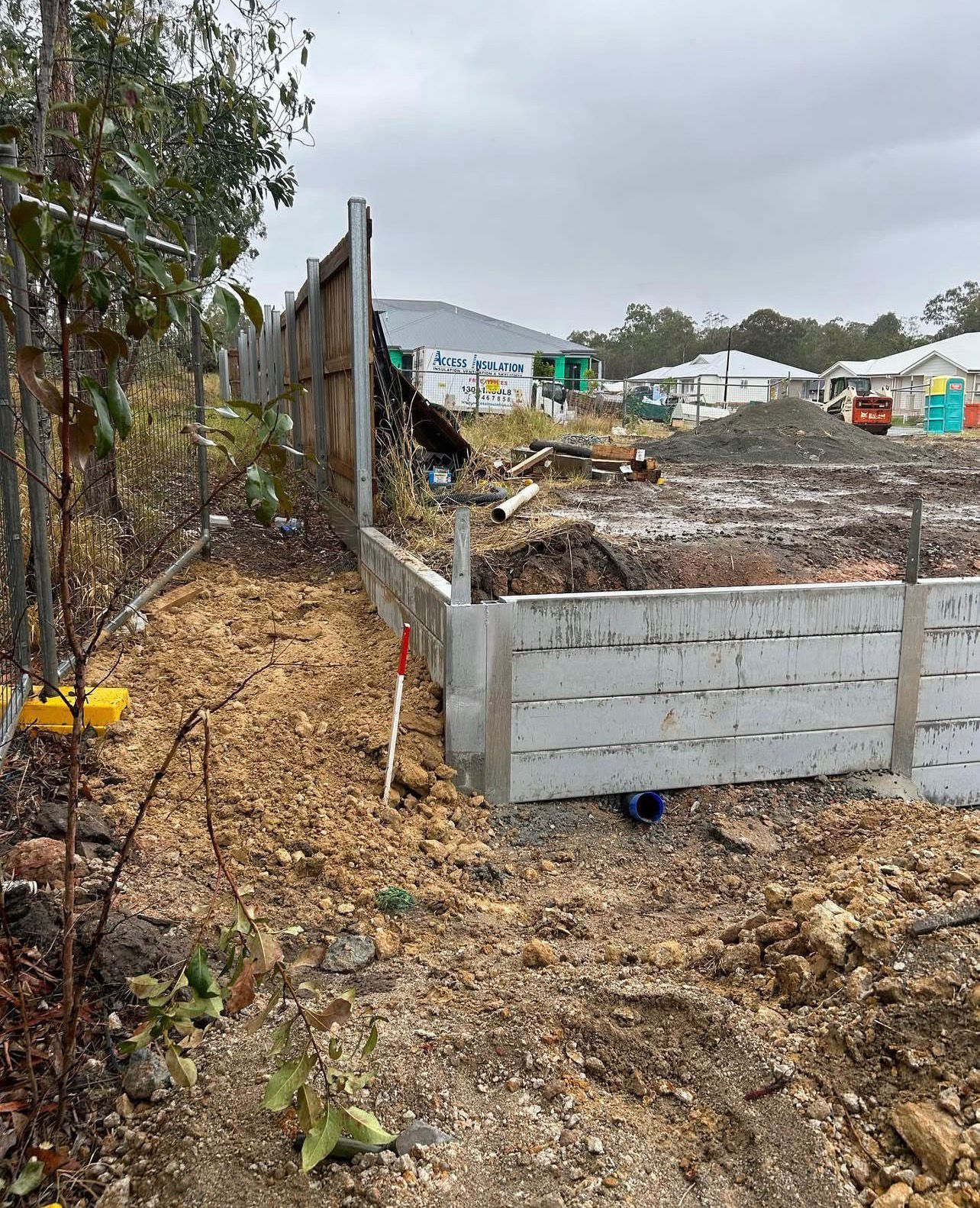 Construction Site With a Concrete Retaining Wall — Chief Structural Landscaping In Glenvale, QLD