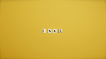 Small SALE letters centered on a yellow background.