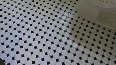 Photo of completed bathroom tile flooring installation project