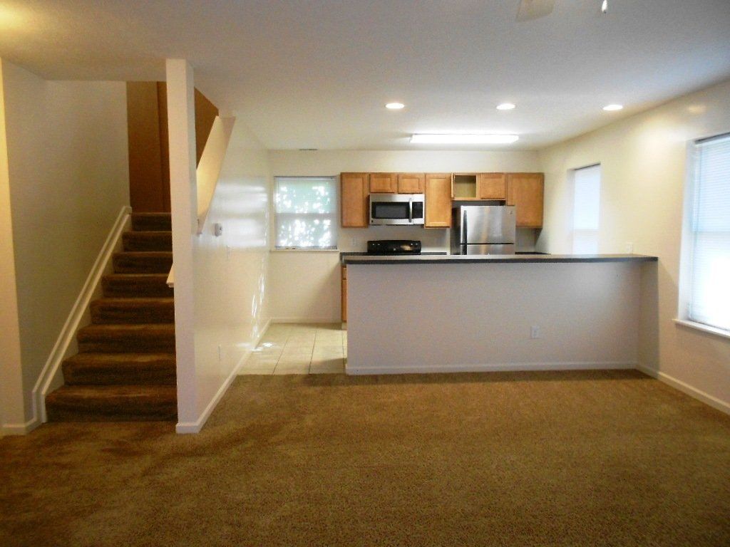31-wilcox-st- Open kitchen, living room with staircase