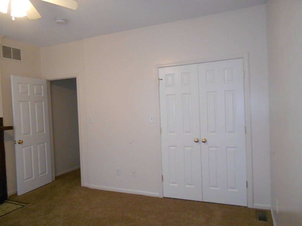 39-E-Patterson- Bedroom with closet and ceiling fan