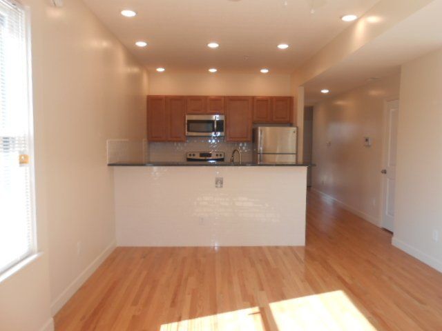 30-38-w-9th-ave- Open Kitchen and Living Room