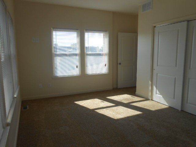 30-38-w-9th-ave- Bedroom with windows