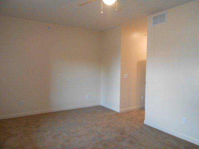 30-38-w-9th-ave- Bedroom with Ceiling fan