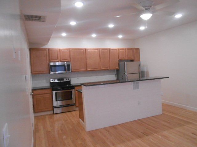 61-67 E. 8th Ave.  - Kitchen 07