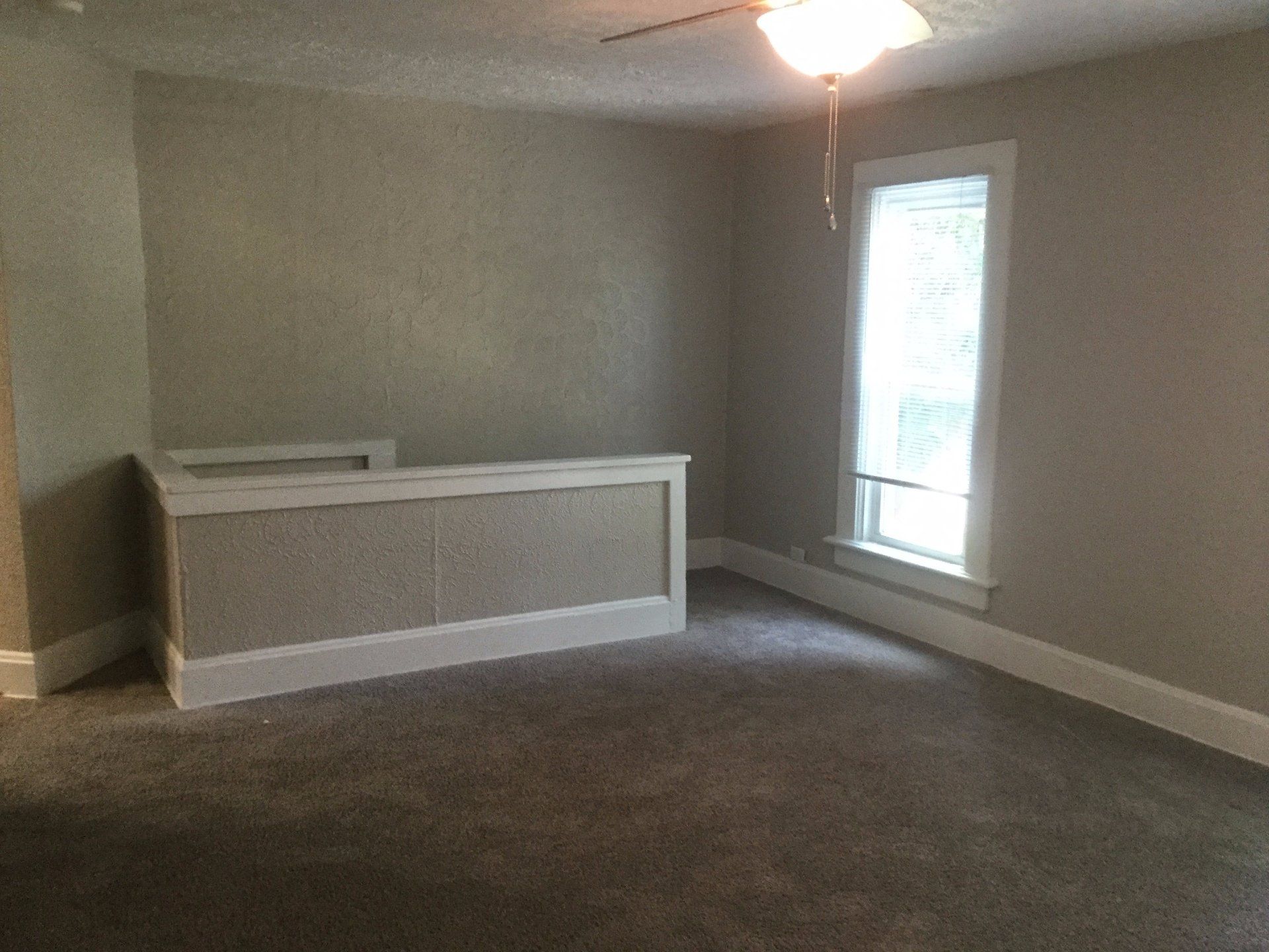 41-43 W. Tompkins living room 1