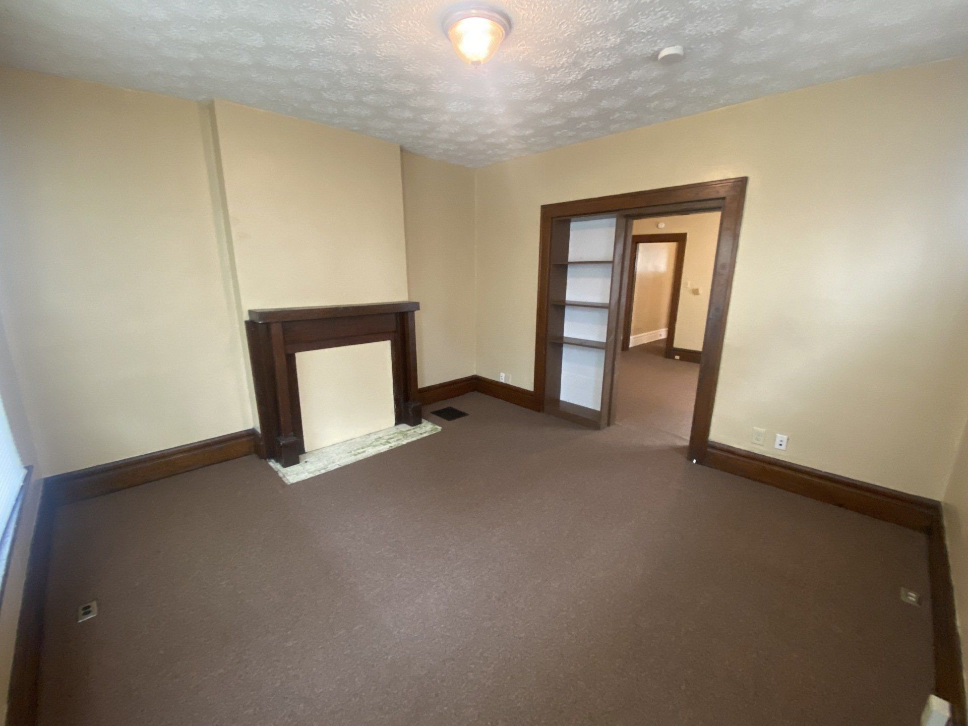 fireplace at 67 W. Oakland Ave