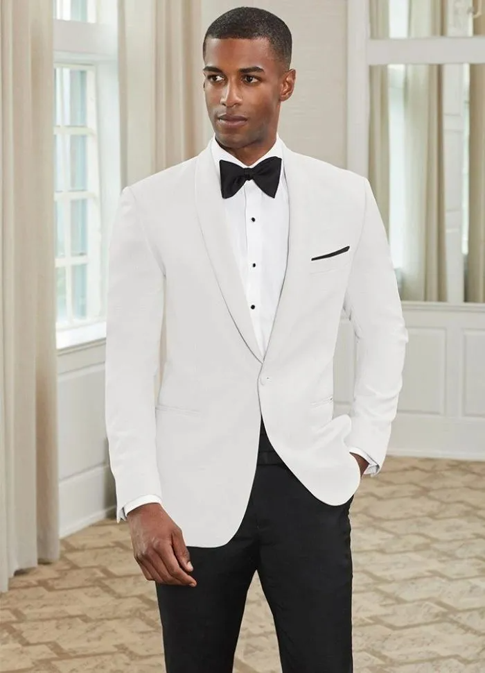 Man Wearing a White Tuxedo