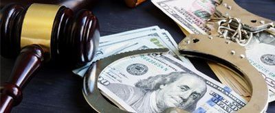 Bond financing — Gavel, handcuffs and bail money in Greenville, SC