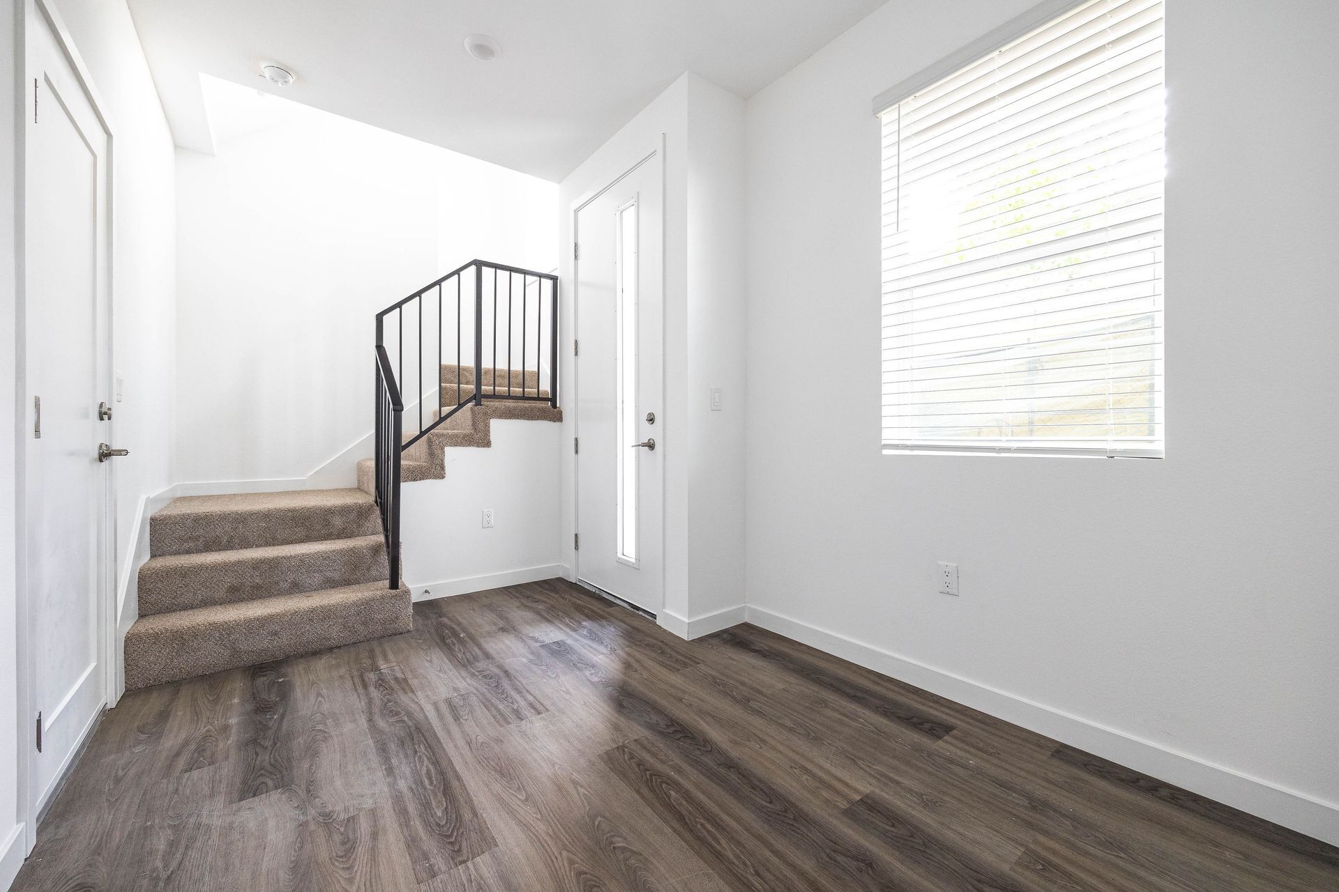 there is a staircase in the middle of the room .