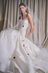 Model wearing an Watters wedding dress