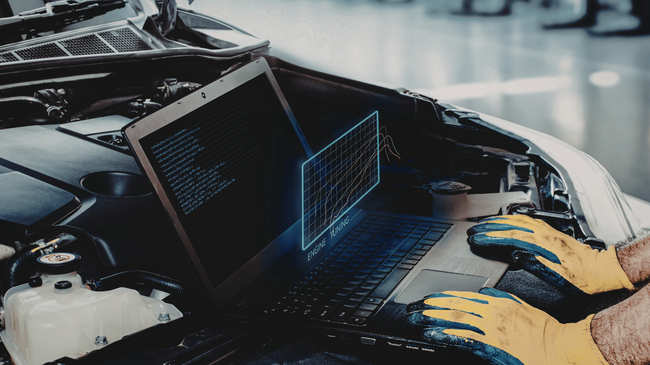 a mechanic doing an engine diagnostic