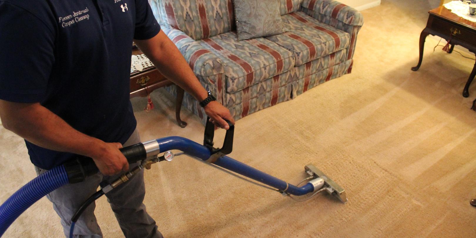 Man Using Vacuum Cleaner On Carpet — Live Oak, FL — Pioneer Janitorial Services