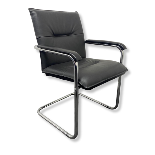 Black office chair with a padded seat and back, armrests, and a five-wheel base.