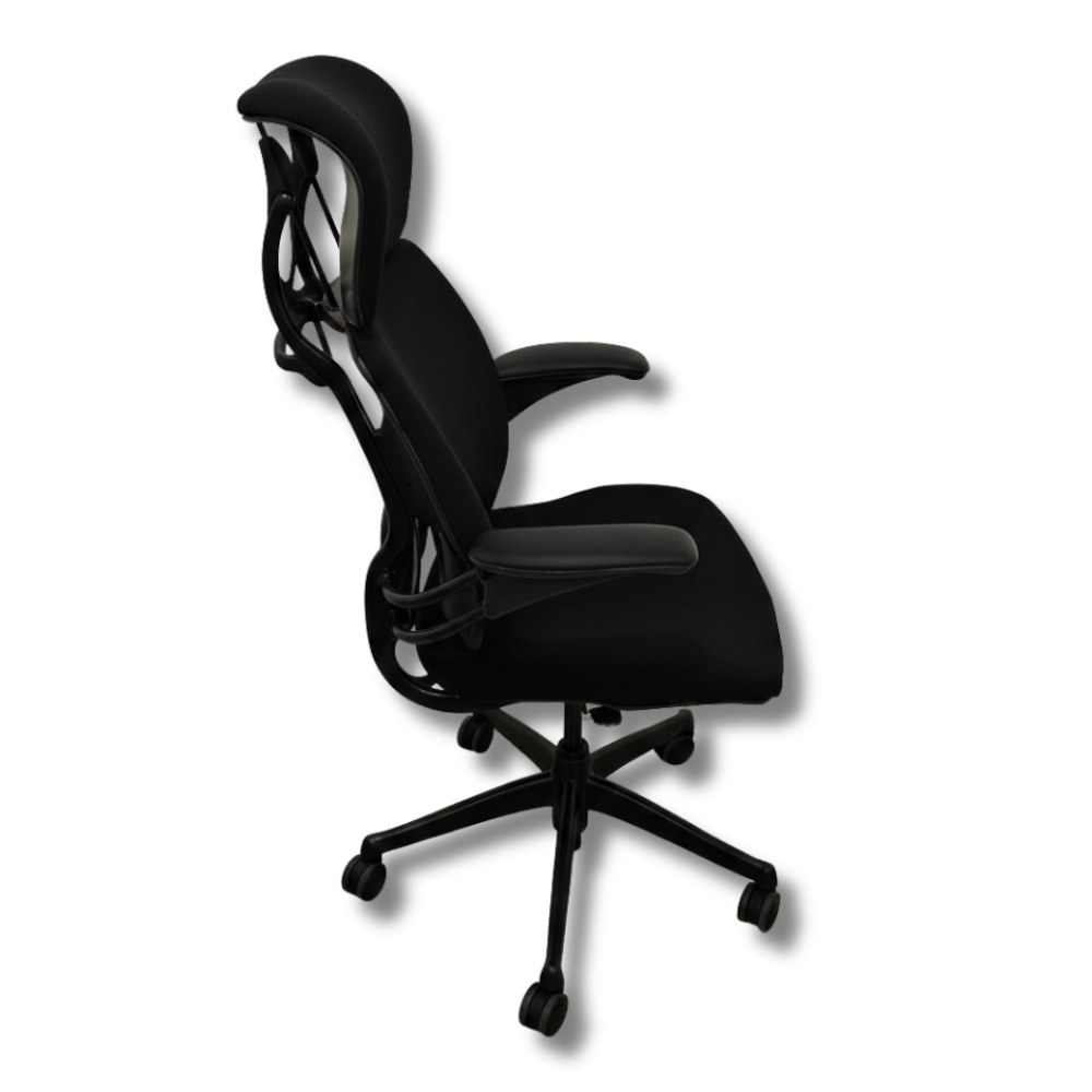 Used Herman Miller Aeron Black ergonomic office chair, side view. Mesh back and seat, armrests, five-star base with wheels.