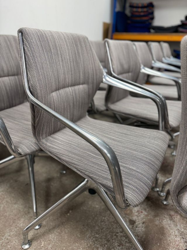 Meeting chairs reupholstered in grey fabric