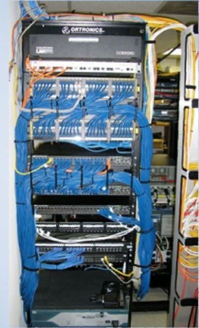 A motorola server with lots of wires coming out of it