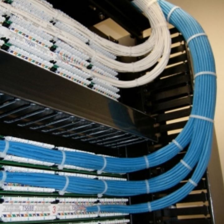 A bunch of blue and white wires are connected to each other