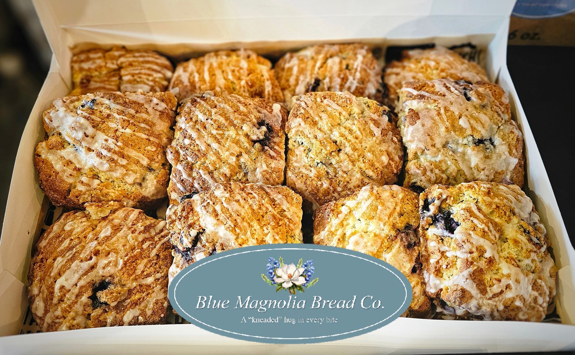 A restaurant with people sitting at tables and chairs