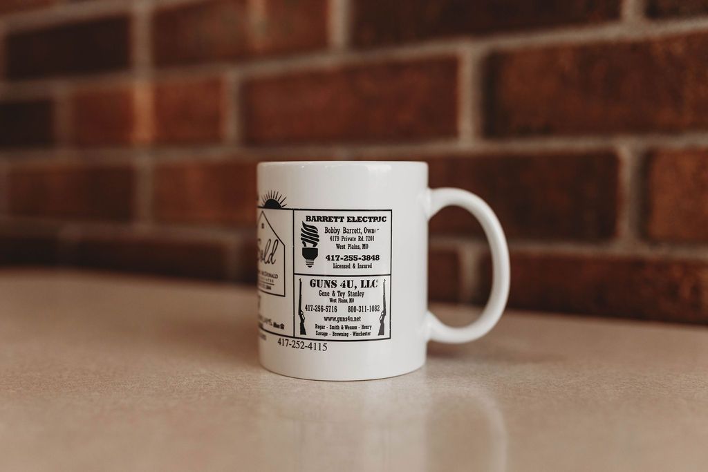 White Coffee Mug —  Willow Springs, MO — American Advertising Associates