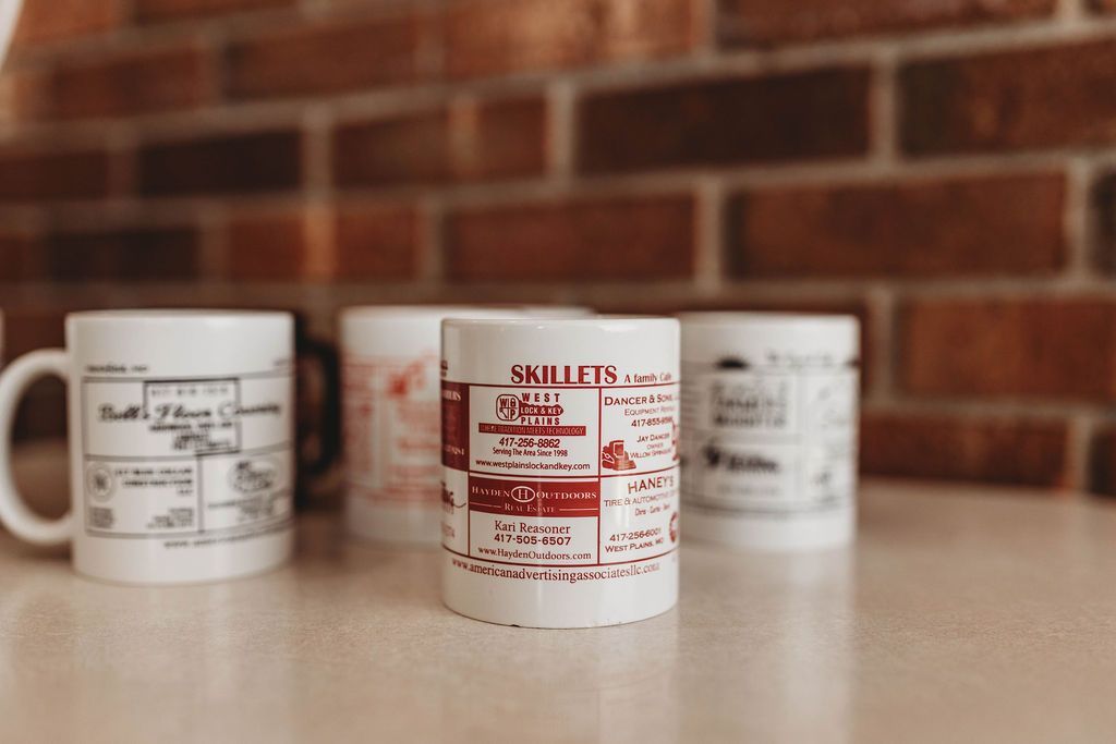 Coffee Mugs on the Table —  Willow Springs, MO — American Advertising Associates