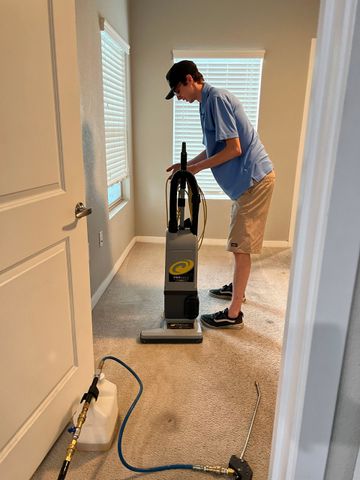 Using Vacuum To Clean Carpet — Queen Creek, AZ — Skyblue Carpet And Tile Cleaning
