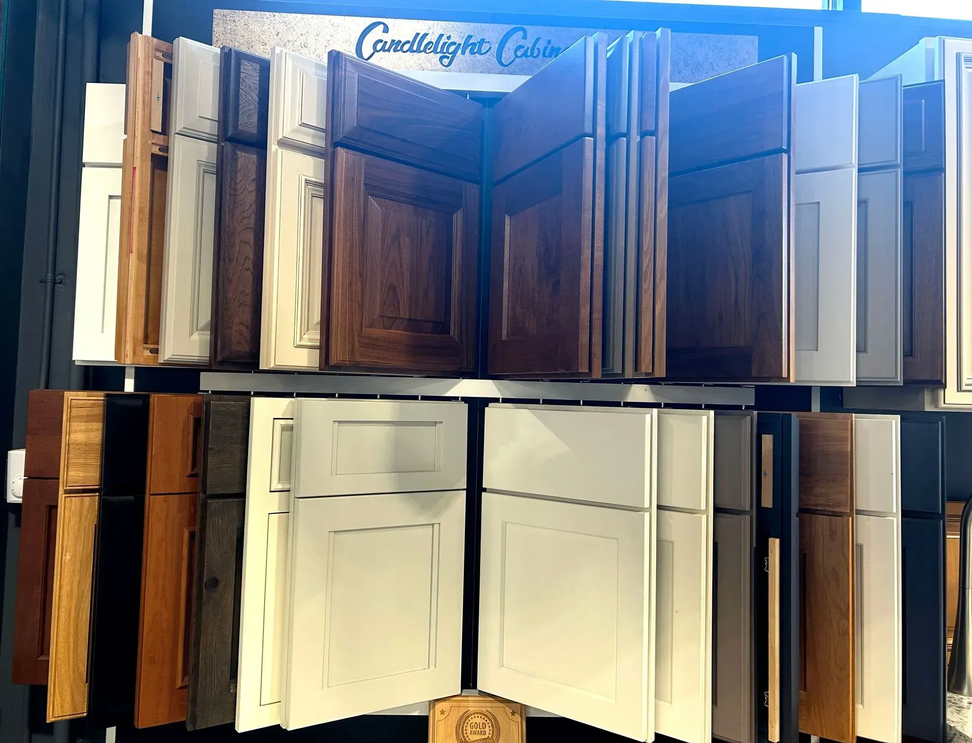 A display of cabinets with different shades of wood