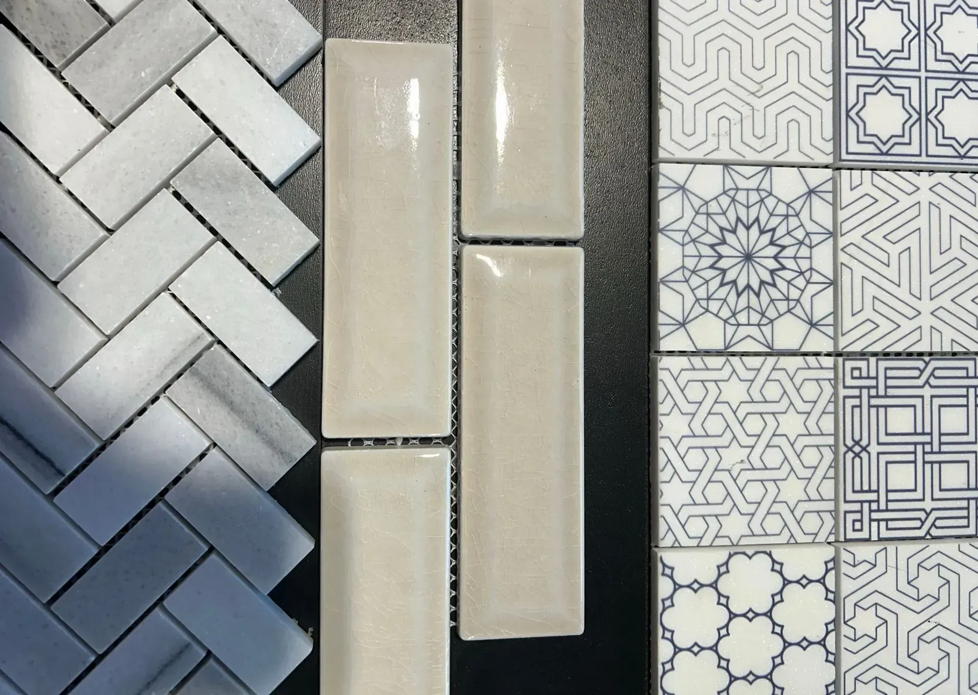 A variety of tiles including a herringbone pattern