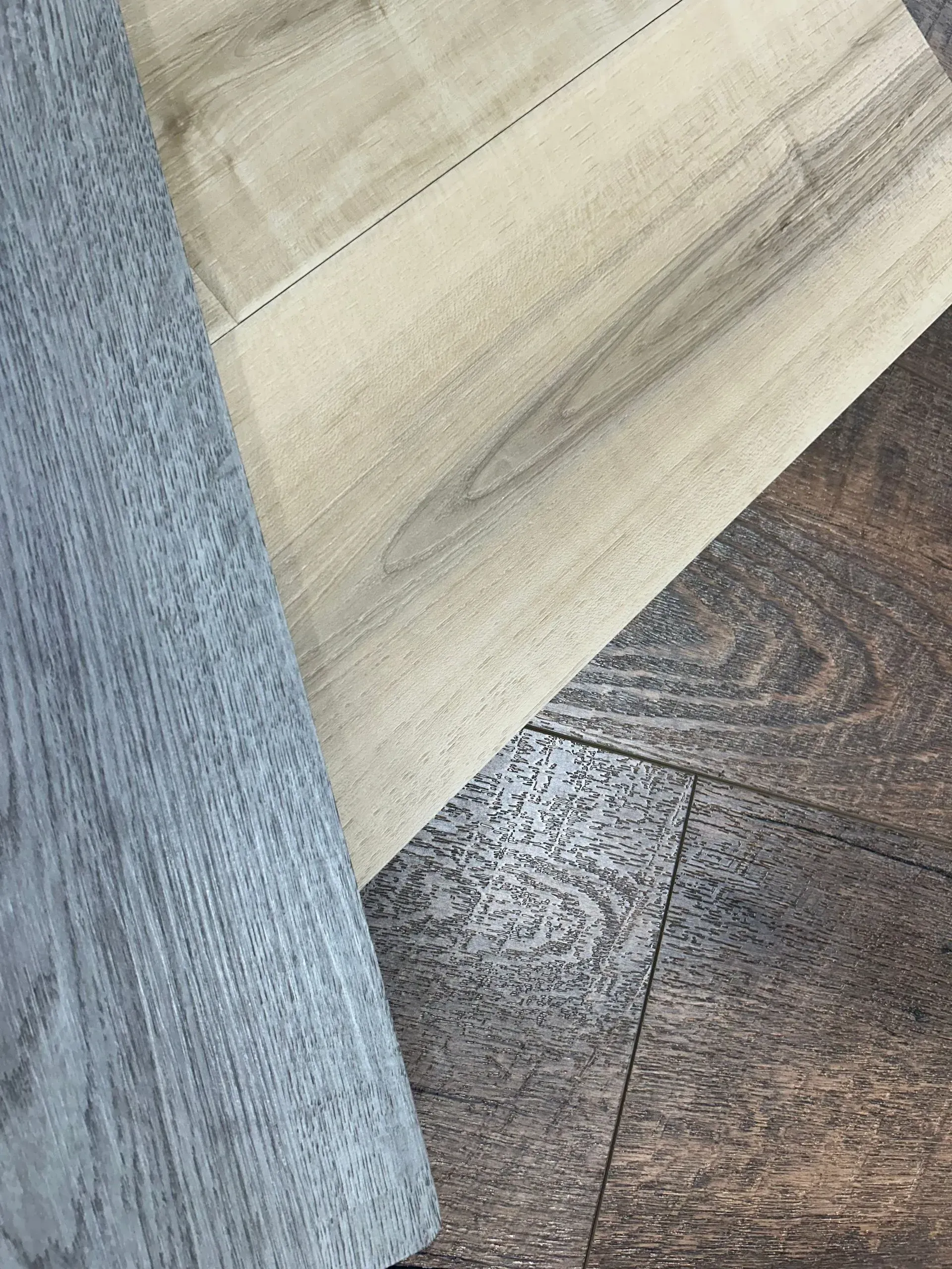 A close up of a piece of wood on a wooden floor.