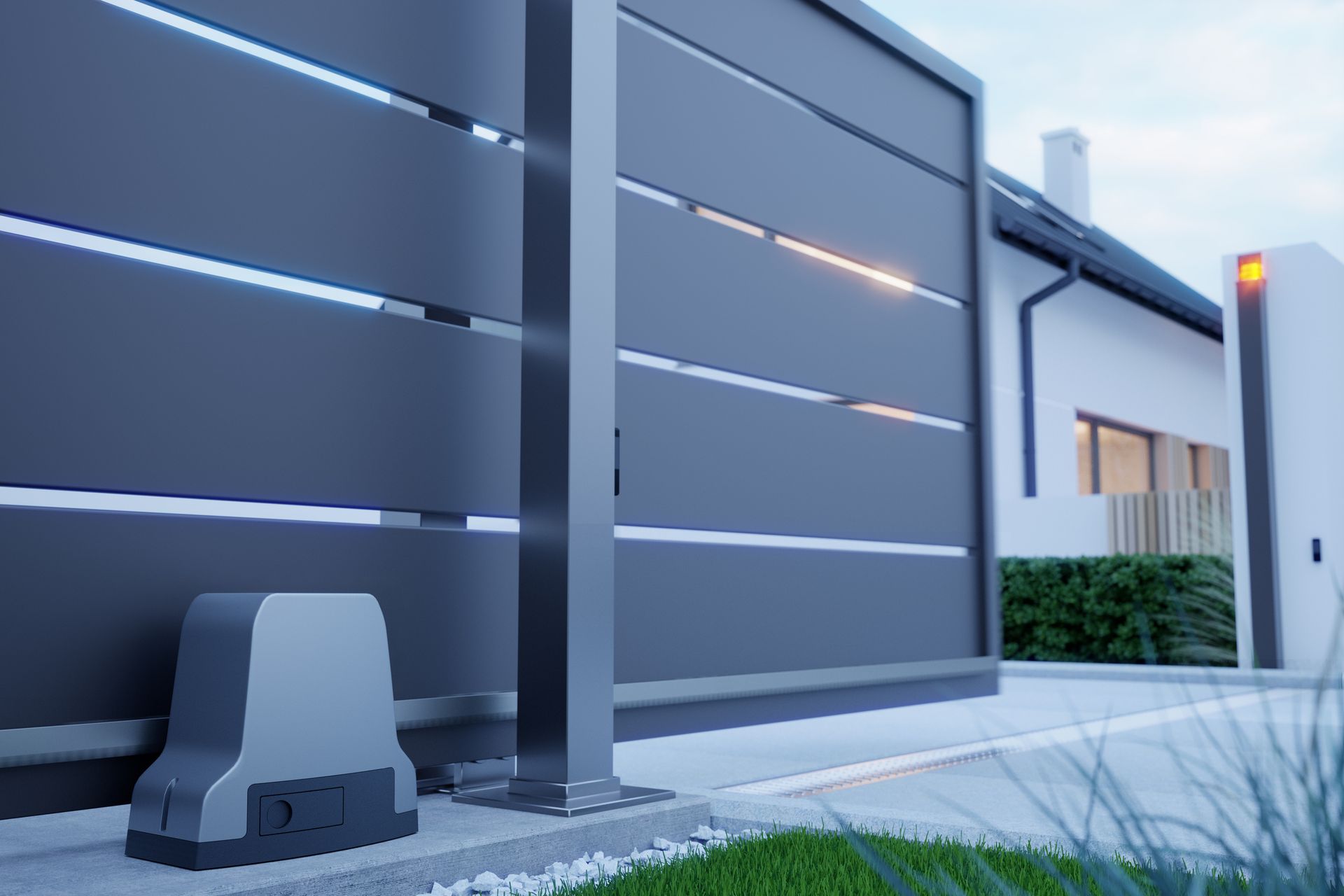 A sliding gate with a motor attached to it is in front of a house.